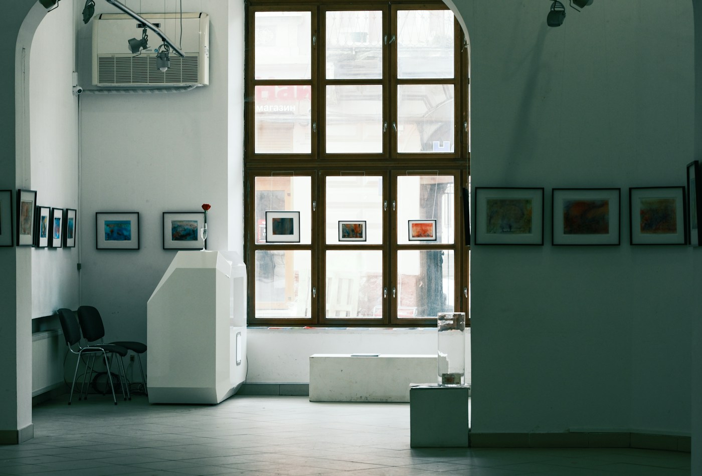 Framed artwork in a sunlit gallery — illustrative stock photograph